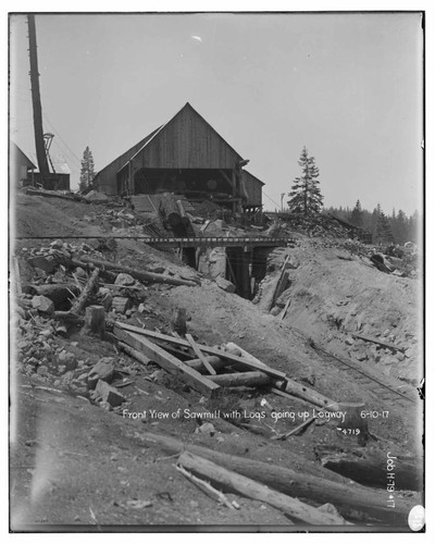 Big Creek Huntington Lake Dams - Front view of sawmill with logs going up logway. Job H