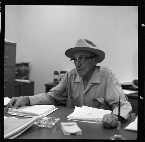 Hydro Generation Supervisor E. I. Bulpitt at his desk