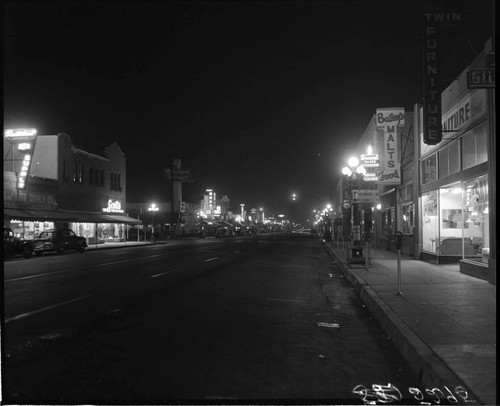 Street lighting in a business district at night