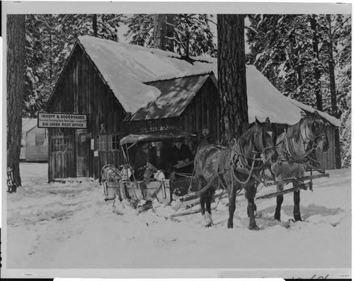 The winter mail sleigh leaves the Big Creek post office during construction days