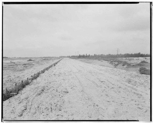 Miscellaneous Transmission : Santa Ana River flood damage to California Electric Power - Open Transmission Line Right of Way