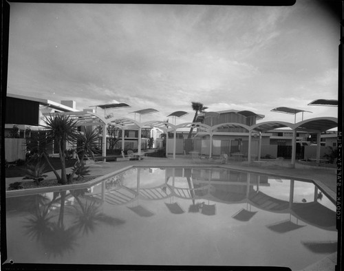 outdoor lighting around pool area at a Ramada Inn