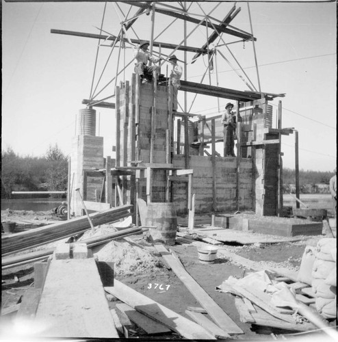 Tower 101 rebuilt with huge concrete base near marsh