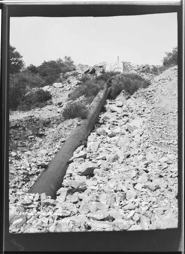 Sierra pipeline [penstock] showing pipe below tunnel in collapsed condition
