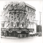 Line of movie-goers in front of the Grand Lake Theatre at Grand Avenue and Lake Park Avenue in Oakland, California