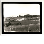 The Central Terrace and Scenic Boulevard Knoll branch office of Mutual Realty Co. and several newly built bungalows in view in the Havenscourt district of Oakland, California