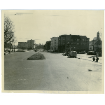 Harrison Street at Grand Avenue in the Adams Point district of Oakland, California. Lake Merritt on left