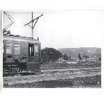 Southern Pacific East Bay Electric Lines "red train" car 314 near the main entrance to the still largely undeveloped Havenscourt Tract at Havenscourt Boulevard and East 14th Street (later International Boulevard) in Oakland, California