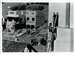 Construction worker on a ladder rebuilding a home on Aquarius Way in the Montclair district of Oakland, California after the October, 1991 East Bay Hills fire