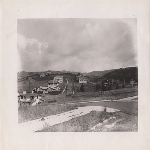 Homes in the still largely undeveloped 4th Avenue Heights tract looking towards the East Bay Hills in Oakland, California. A Key System streetcar is just visible on the right
