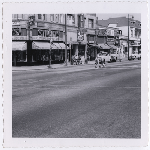 Strom's Clothiers, corner of Stanford and San Pablo Avenues looking northwest in the Golden Gate district of Oakland, California