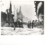 Firemen on scene battling the remains of the Tubbs Hotel in Oakland, California