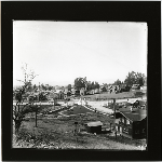 Westward view of entrance to Rock-Ridge Place tract showing gates on Broadway and the McMillan tract beyond