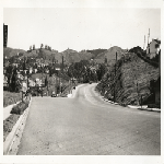 Intersection of Broadway and Patton looking north toward the East Bay hills in Oakland, California