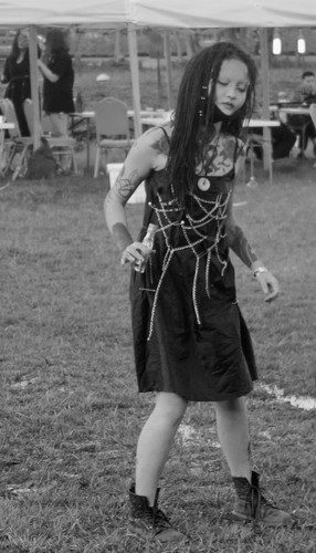 Young Chinese woman dancing at a music festival 2 of 2