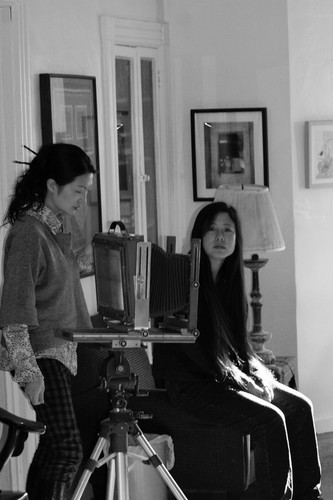 Chinese photographer with Xiaojian in Brooklyn house