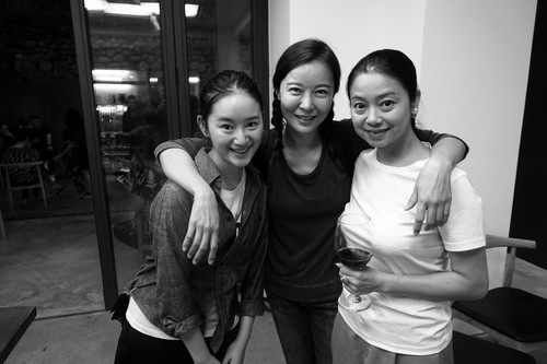 Two actresses and dancer at party in Yue Minjun's house