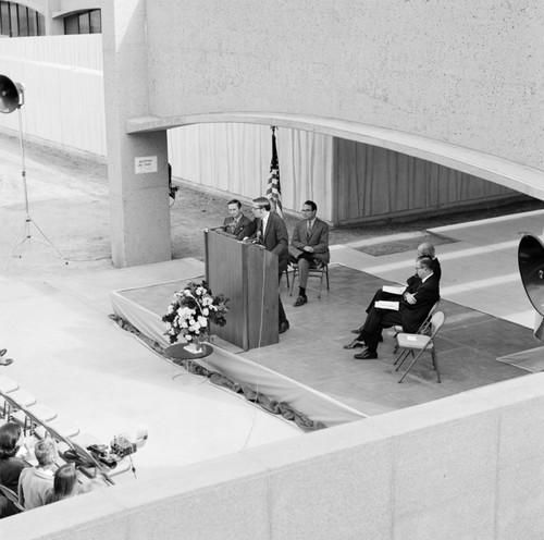 Speaker at podium during dedication of the Basic Science Building, UC San Diego