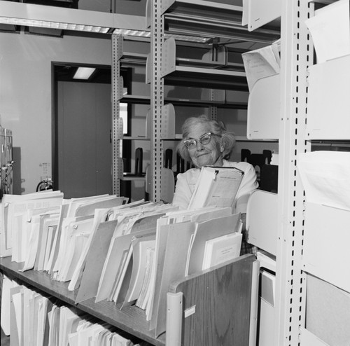 Laura Clark Hubbs in the Hubbs Library, preparing materials for shift from Marine Biology Building to Eckart Building