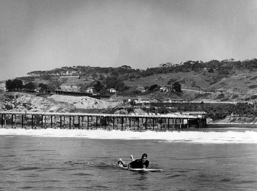 Surfer near the Scripps Pier, Scripps Institution of Oceanography