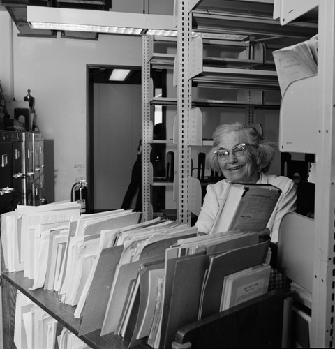 Laura Clark Hubbs in the Hubbs Library, preparing materials for shift from Marine Biology Building to Eckart Building