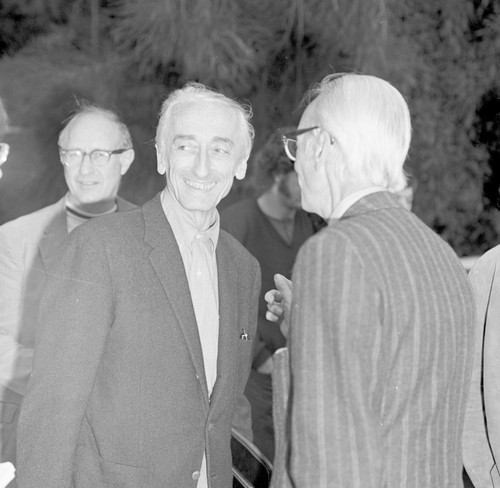 Jacques Cousteau and Fred Noel Spiess (back left), during Cousteau's visit to Scripps Institution of Oceanography