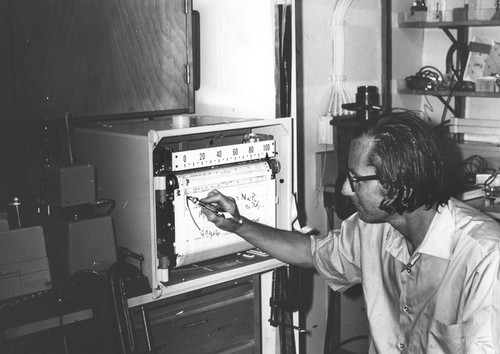 Peter Dreizen with chart aboard the R/V Alpha Helix off Kona Island, Hawaii