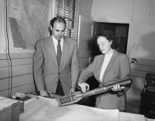 John D. Cochrane and unidentified woman with bathythermograph (BT)