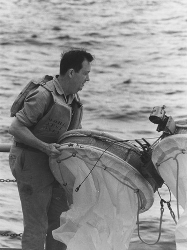 Edward W. Fager with bongo net during the Piquero Expedition