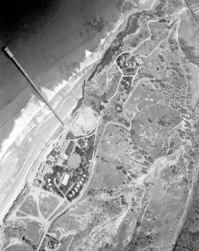 Aerial view of Scripps Institution of Oceanography campus and pier, and of Seaweed Canyon