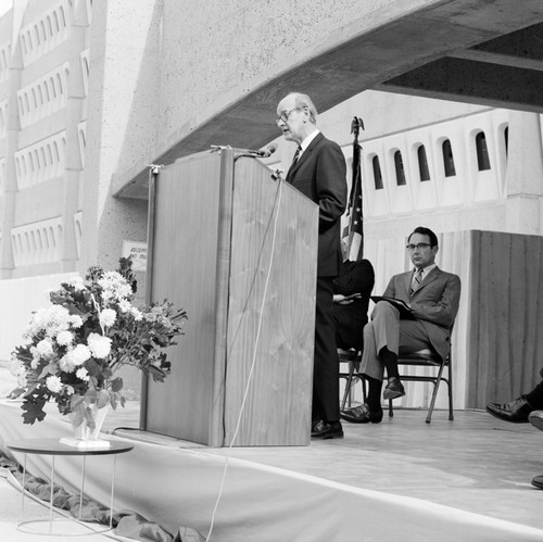 Speaker at podium during dedication of the Basic Science Building, UC San Diego