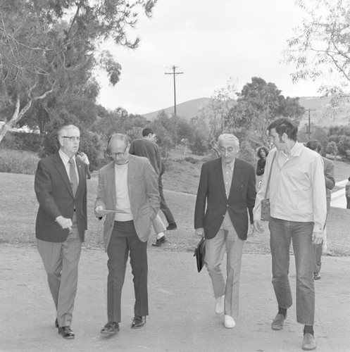 Jacques Cousteau (center right) and Fred Noel Spiess (center left), during Cousteau's visit to Scripps Institution of Oceanography