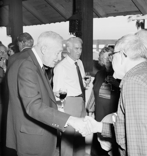 Roger Revelle and Willard Bascom (behind) at Roger's 80th birthday party