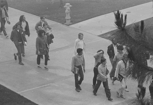 Students protesting against the Vietnam War, marching towards Urey Hall, UC San Diego