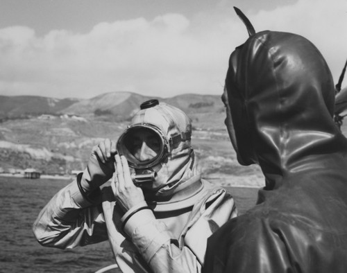 Jacques Cousteau (left) in scuba gear