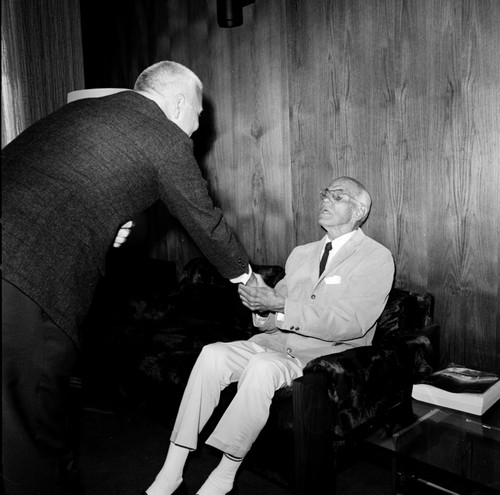 Chancellor William J. McGill (standing) and Ernest W. Mandeville (seated), Gifts and Endowments Mandeville Presentation, UC San Diego