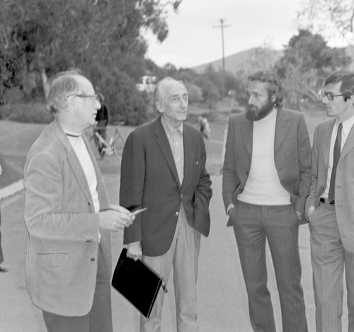 Jacques Cousteau (center left) and Fred Noel Spiess (left), during Cousteau's visit to Scripps Institution of Oceanography