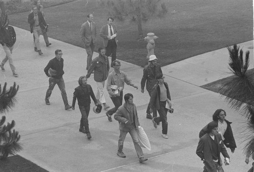 Students protesting against the Vietnam War, marching towards Urey Hall, UC San Diego