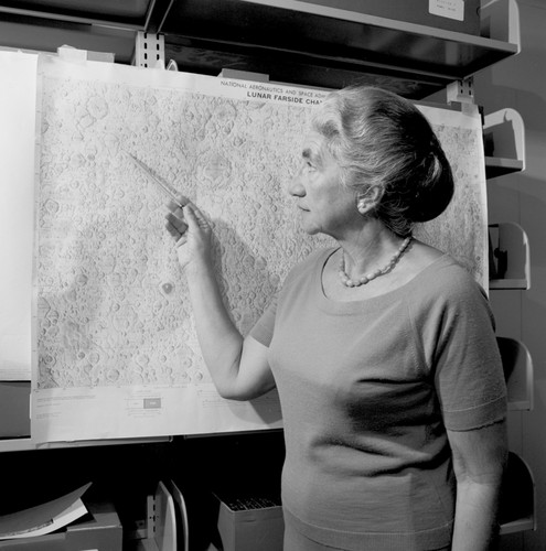 Gertrude Weiss Szilard with lunar maps and moon globe, UC San Diego