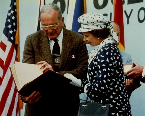 William A. Nierenberg (holding book) with Queen Elizabeth II during visit, Scripps Institution of Oceanography