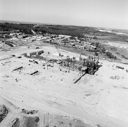 Aerial view of construction at UC San Diego, looking north-west towards the coastline and Camp Matthews