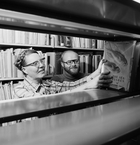 Elizabeth Shor and librarian William J. Goff in the Hubbs Library, Marine Biology Building, preparing for its move to the Eckart Building