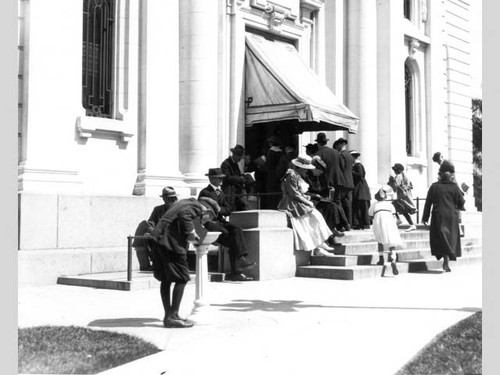 Library patrons on steps of the Carnegie Library Building, San Diego Public Library, early 1900s