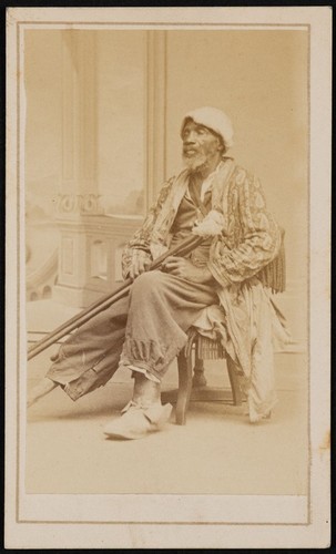 Photograph of an African American man with prosthetic leg