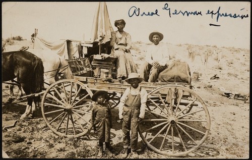 African Americans with a horse drawn carriage