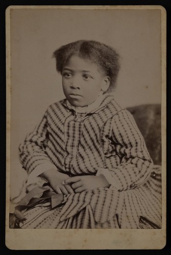 Photographs of an African American girl