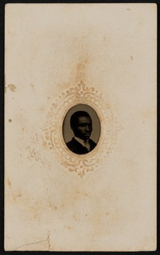 [Gem tintype of an African American man in dark suit]