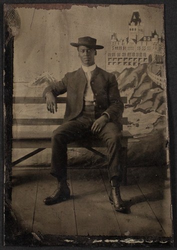 Photograph of an African American man with Cliff House backdrop