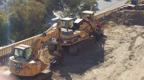 Caterpillar excavator at construction site, August 16, 2015