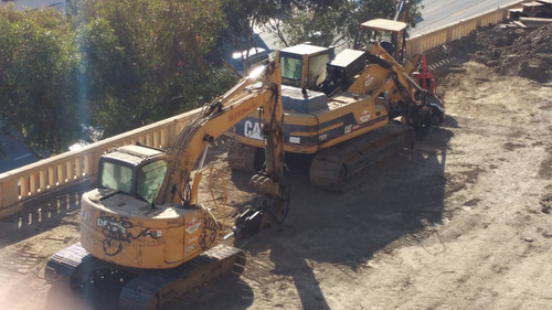 Caterpillar excavator at construction site, August 16, 2015